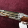 12g over & under by Boxall & Edmiston 30 x 2 3/4" multi-choked barrels