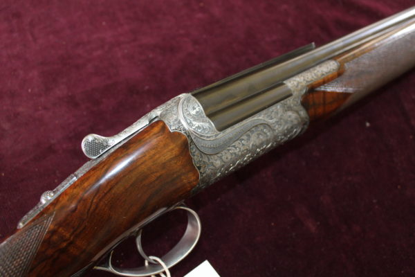 12g over & under by Boxall & Edmiston 30 x 2 3/4" multi-choked barrels