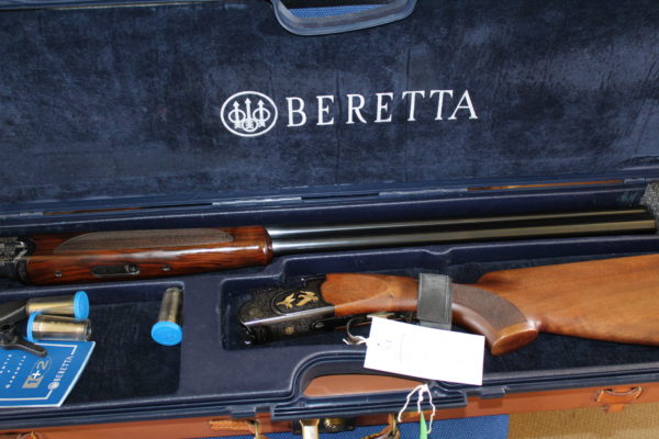 12g over & under by Beretta 30 x 3" barrels