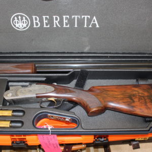 12g over & under by Beretta 28 x 3" barrels