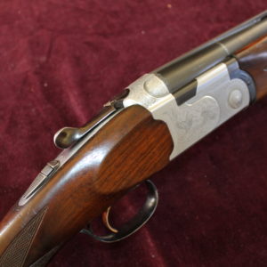 12g over & under by Beretta 28 x 2 3/4" barrels
