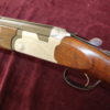 12g over & under by Beretta 28 x 2 3/4" barrels