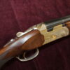 12g over & under by Beretta 28 x 2 3/4" barrels