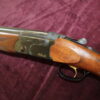 12g over & under by Beretta 28 x 2 3/4" multi-choke barrels
